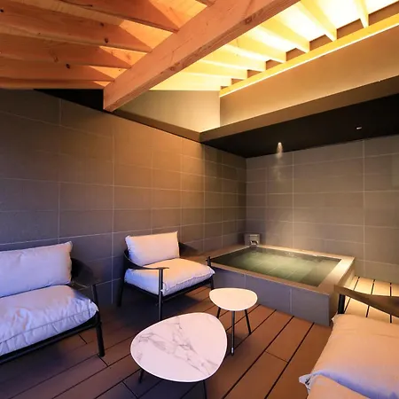 Fuji Onsenji Yumedono Hotel Fujikawaguchiko Exterior photo A private onsen bath at the Hoshinoya Kyoto